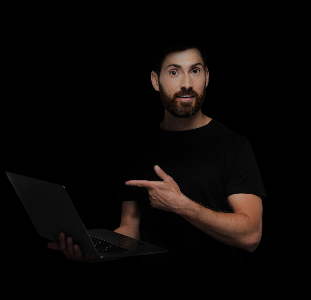 A creative director from our agency with a look of excitement, pointing to a design on his laptop that ignites a brand's soul.